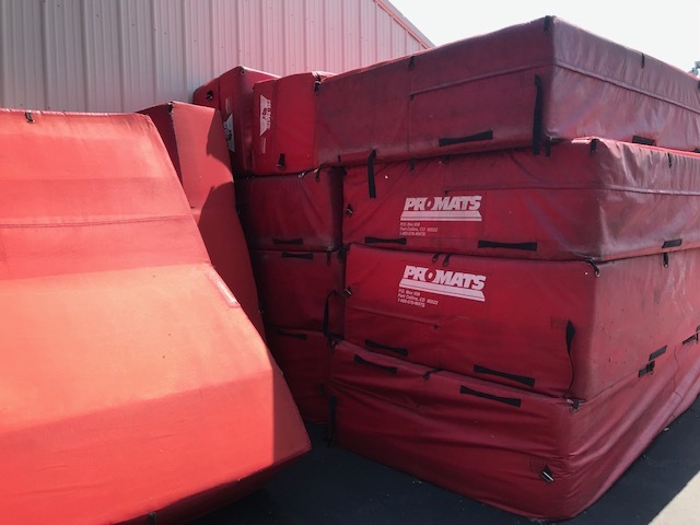 LARGE TARP STYLE MAT COVERS AND RED MATS