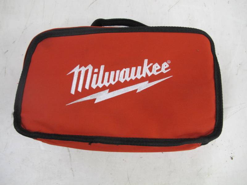 lot 179 image: Milwaukee M12 14 Hex Screwdriver w bag and 2 batteries - Bad Trigger Cover