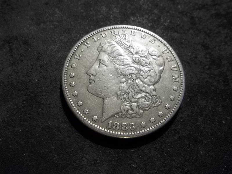 lot 9 image: 1883 S Morgan Silver Dollar