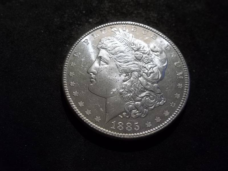 lot 12 image: 1885 Morgan Silver Dollar