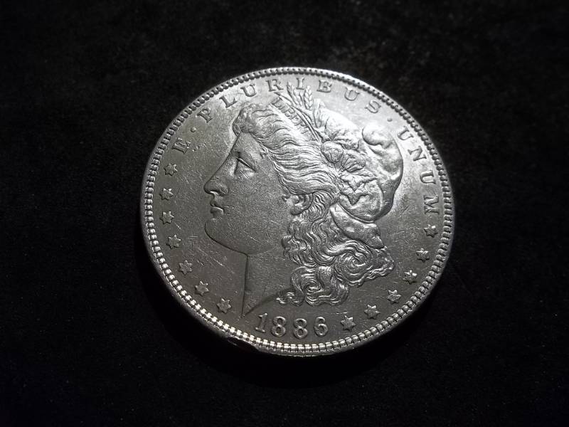 lot 14 image: 1886 Morgan Silver Dollar