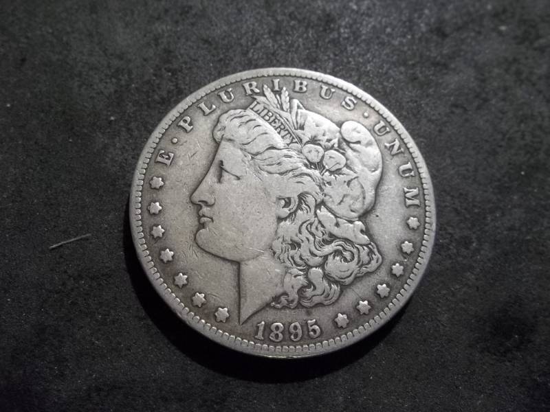 lot 21 image: 1895 S Morgan Silver Dollar