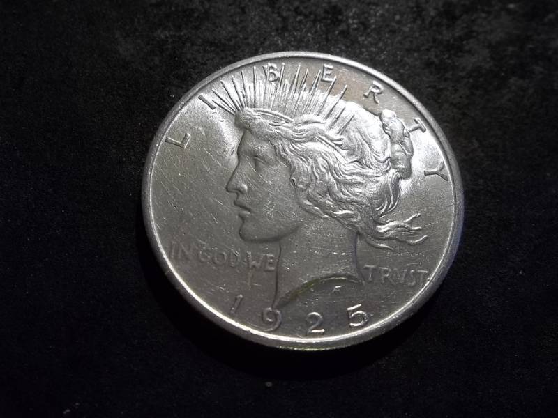 lot 36 image: 1925 Peace Silver Dollar