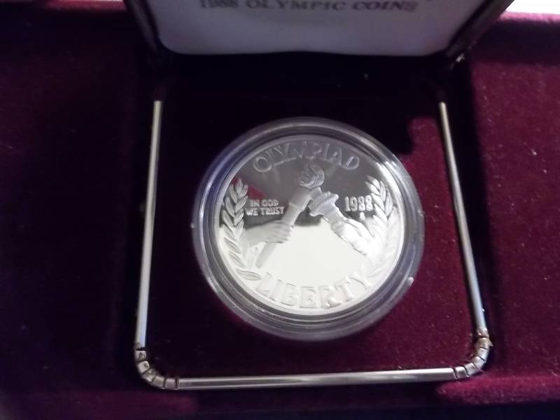 lot 54 image: 1988 US Mint Olympic Silver Proof Dollar