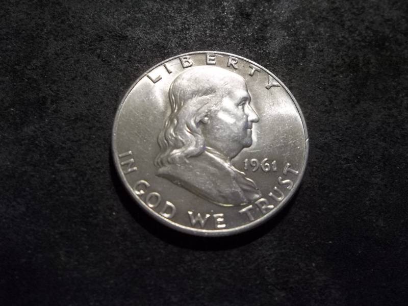 lot 106 image: 1961 D Franklin Half Dollar