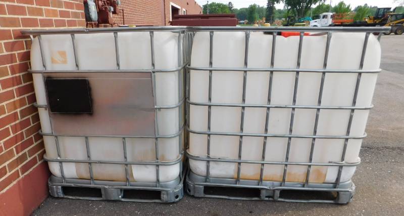 lot 21 image: Two 275 Gallon Plastic Totes