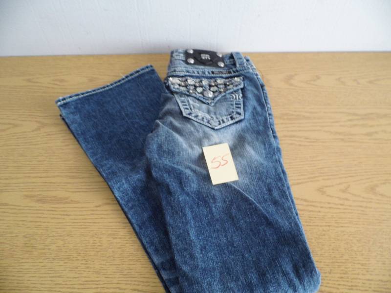 lot 55 image: Miss Me Jeans