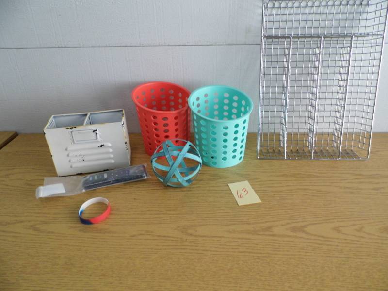 lot 63 image: Silver Organizer - Roku Remote