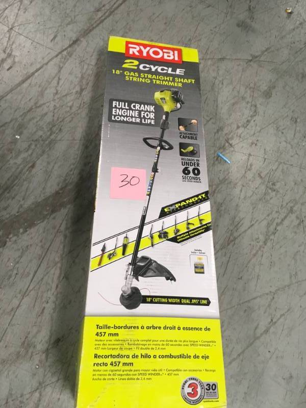 lot 30 image: RYOBI 25cc 2-Cycle Attachment Capable Full Crank Straight Gas Shaft String Trimmer in good condition