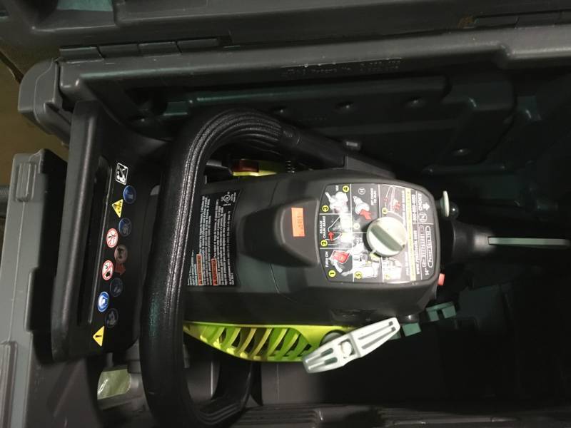 lot 42 image: RYOBI 18 in. 38cc 2-Cycle Gas Chainsaw with Heavy Duty Case in good condition