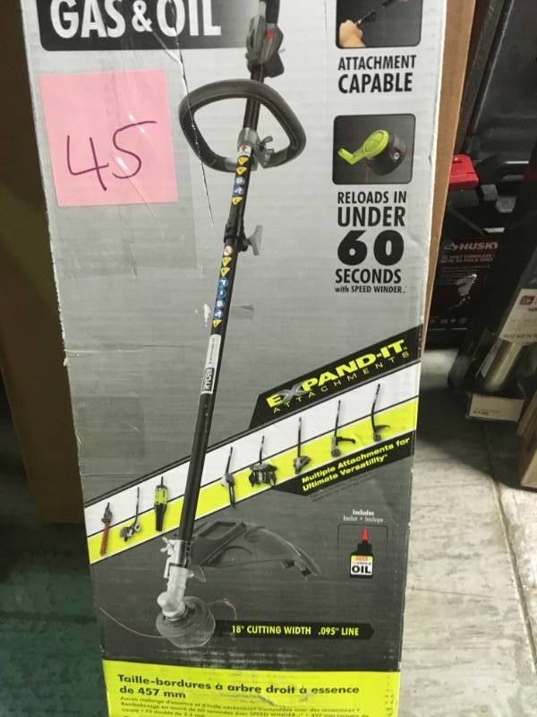 lot 45 image: RYOBI 4-Cycle 30cc Attachment Capable Straight Shaft Gas Trimmer in good condition