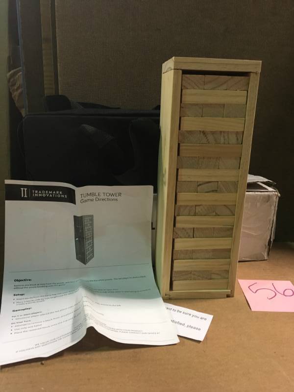 lot 56 image: Trademark Innovations 12 in. 54-Piece Wooden Stacking Puzzle Game with Wood Box and Carry Case in good condition