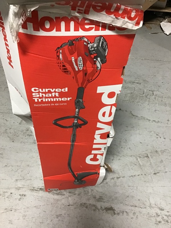 lot 119 image: Homelite 2-Cycle 26 CC Curved Shaft Gas Trimmer in good conditions