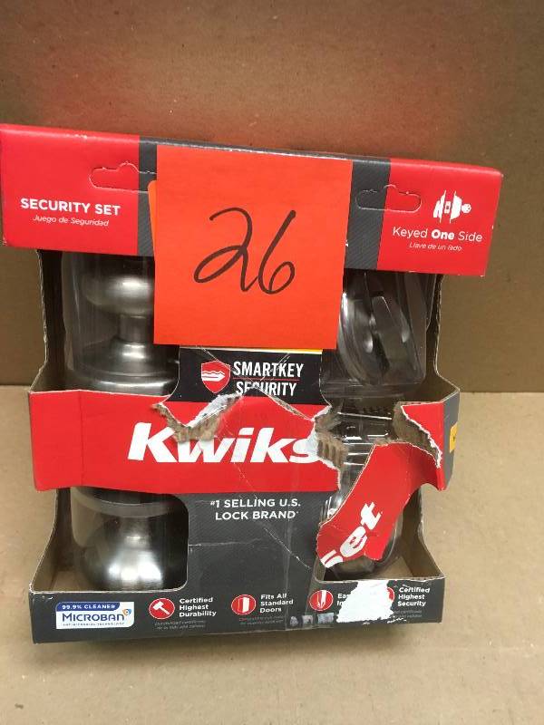 lot 26 image: Kwikset Juno Satin Nickel Exterior Entry Door Knob and Single Cylinder Deadbolt Combo Pack Featuring SmartKey Security  in good condition