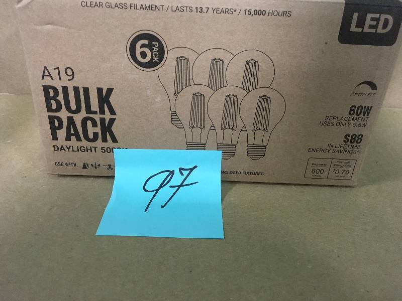 lot 97 image: 60-Watt Equivalent A19 Clear Glass Vintage Decorative Edison Filament Dimmable LED Light Bulb Soft White (6-Pack) not used