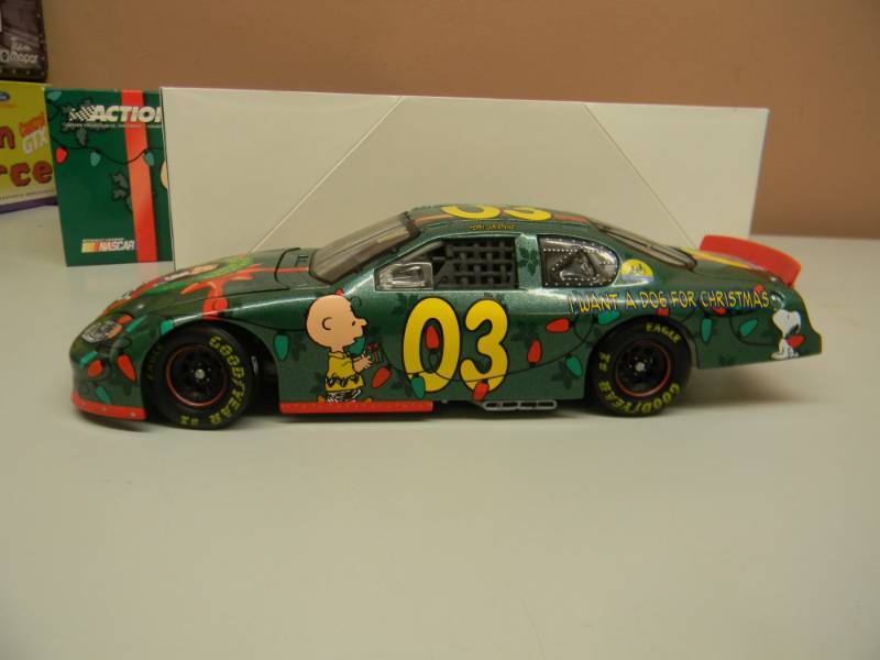 lot 48 image: PEANUTS - 124 SCALE STOCK CAR - LIMITED EDITION 1 OF 2280 - 2003 MONTE CARLO - I WANT A DOG FOR CHRISTMAS CHARLIE BROWN - NEW IN BOX - SEE PICTURES