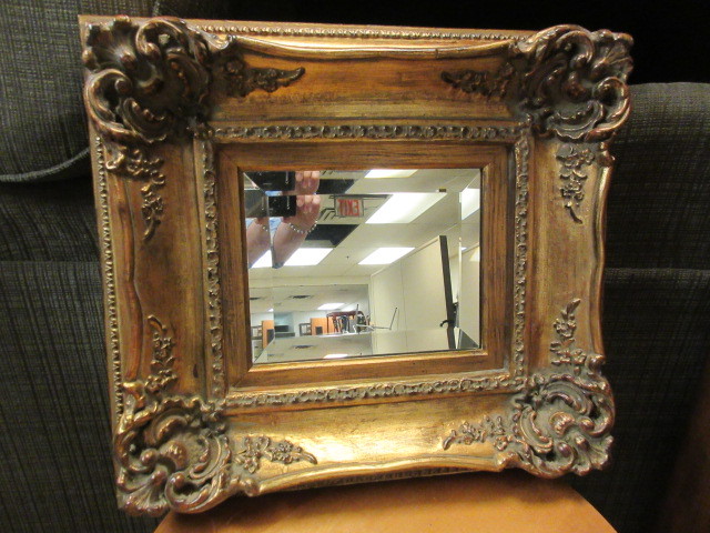 lot 124 image: ORNATE GOLDEN FRAMED MIRROR