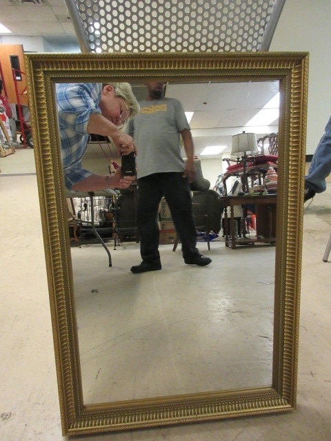lot 134 image: GOLDEN FRAMED MIRROR