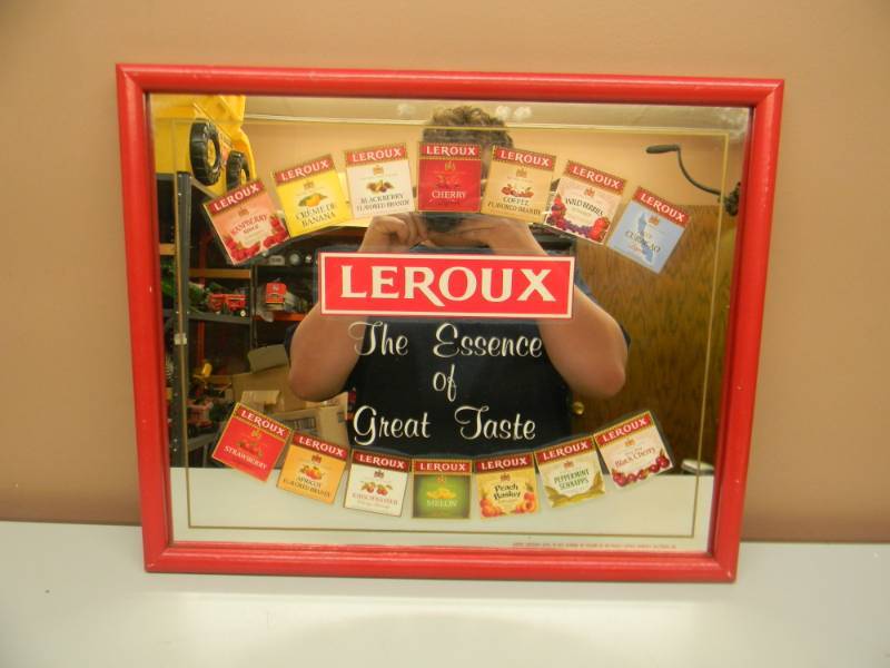 lot 55 image: LEROUX THE ESSENCE OF GREAT TASTE MIRROR BAR SIGN - APPROX 22 BY 18 - SEE PICTURES