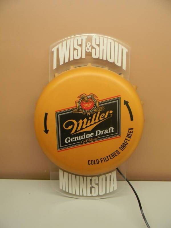 lot 57 image: VINTAGE MILLER GENUINE DRAFT TWIST AND SHOUT MINNESOTA BEER LIGHT SIGN - VERY COOL SIGN, NEEDS A BULB - APPROX 30 BY 19 - SEE PICTURES