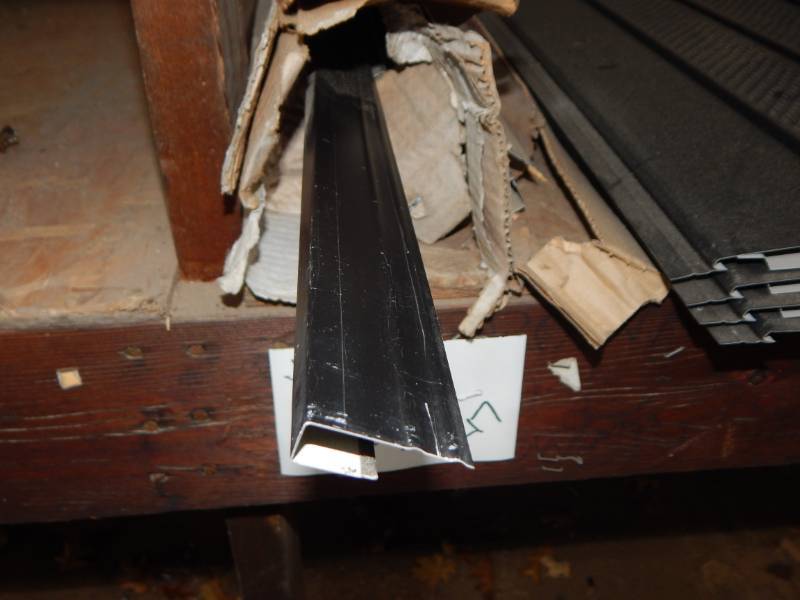 lot 47 image: Black soffit J channel