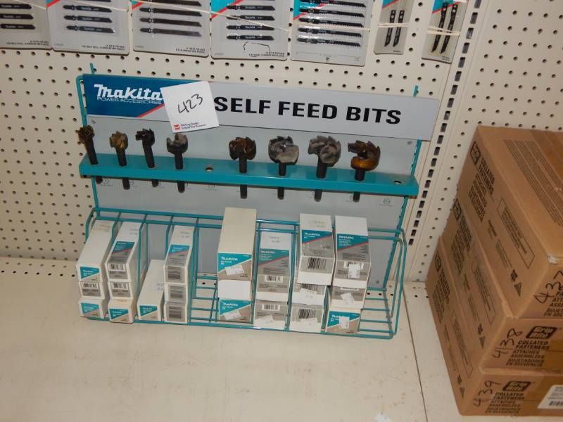 lot 423 image: Lot of Makita Self Feed Bits with hanging stand