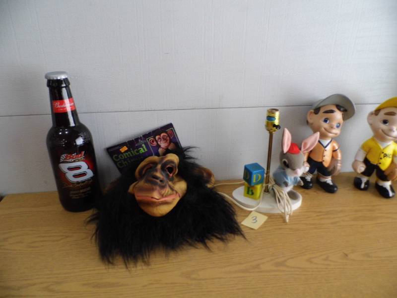 lot 3 image: Lamp - Chimp Mask - Baseball Figure