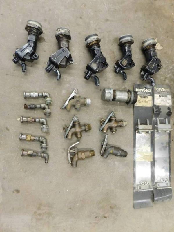 lot 31 image: Misc. Lot of Oil Drum Spigots, Funnels & Water Cans