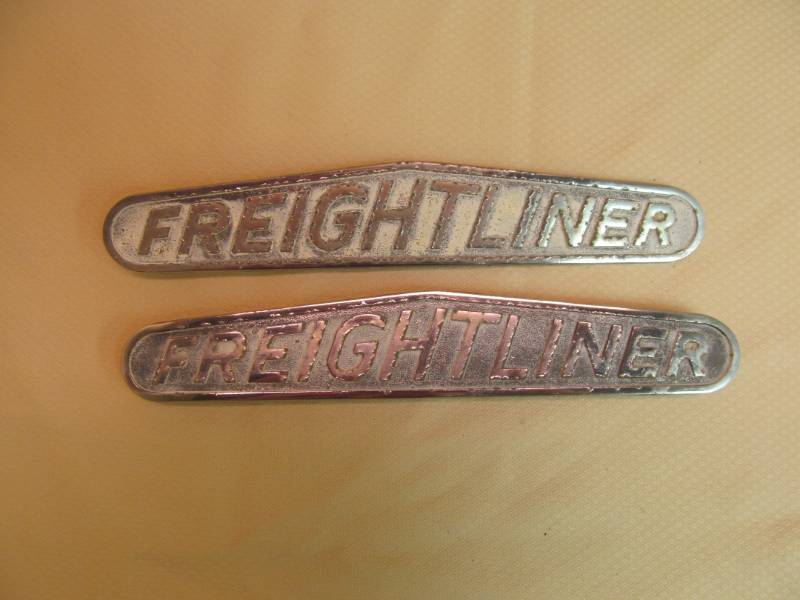 lot 15 image: (2) Metal Freightliner Trim Emblems