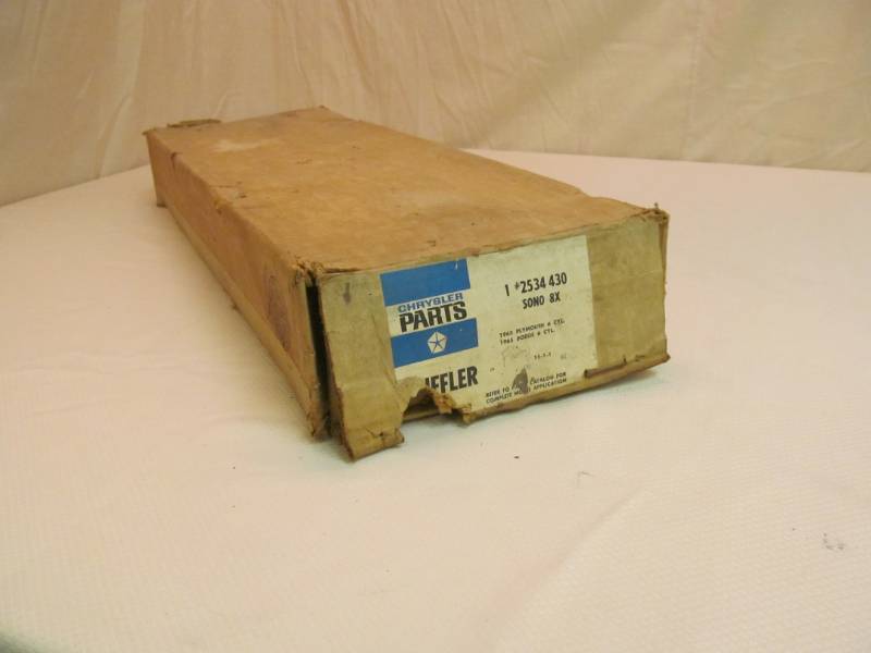 lot 33 image: Vintage Mopar Muffler