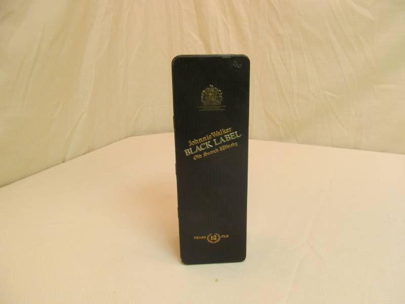 lot 102 image: Vintage Johnnie Walker Tin