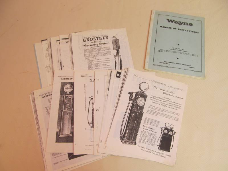 lot 150 image: Large Group of Vintage Fuel Pump Adverting