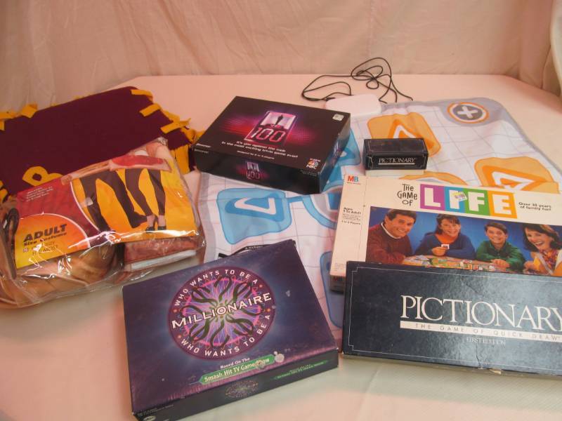lot 153 image: Adult PBJ Costume, Wii Game Pad, Board Games