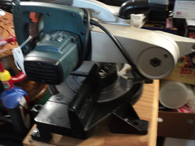 lot 2 image: Black and Decker Saw on Woodstand...