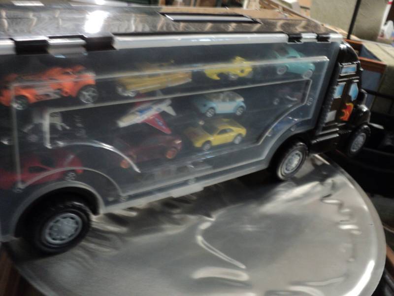 lot 13 image: Matchbox Storage Semi and Cars sto...