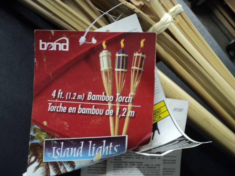 lot 39 image: 4 ft Bamboo Torch Lites...