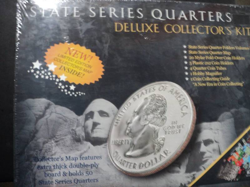 lot 77 image: New State Series Quarter Deluxe Col...