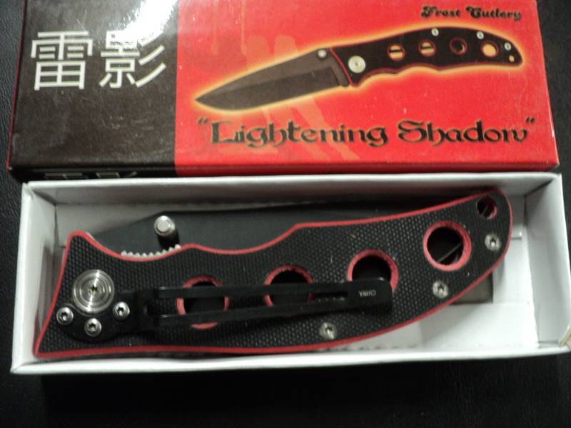 lot 99 image: Lightening Shadow Knife...
