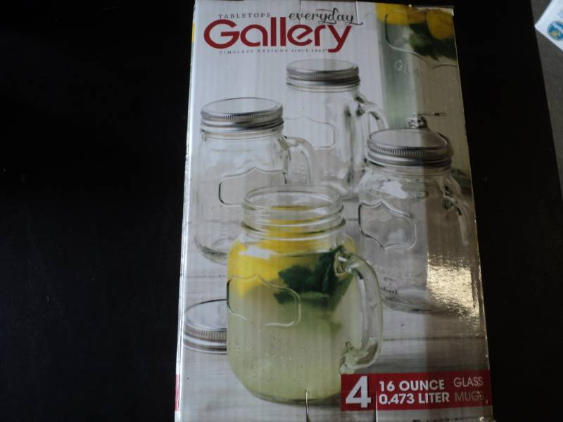 lot 160 image: 4 - 16 oz Glass Mugs...