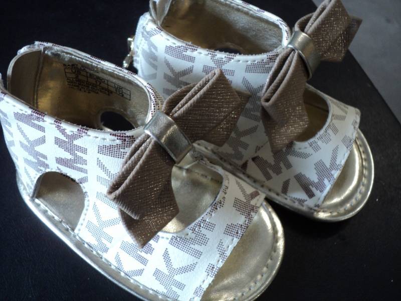 lot 202 image: Michael Kors Baby Shoes...