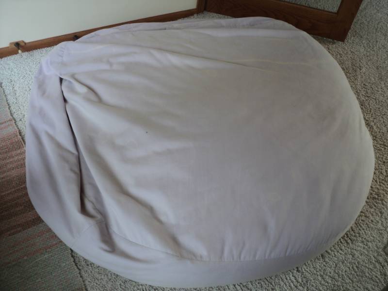 lot 216 image: Large Bean Bag- has a sun faded lin...