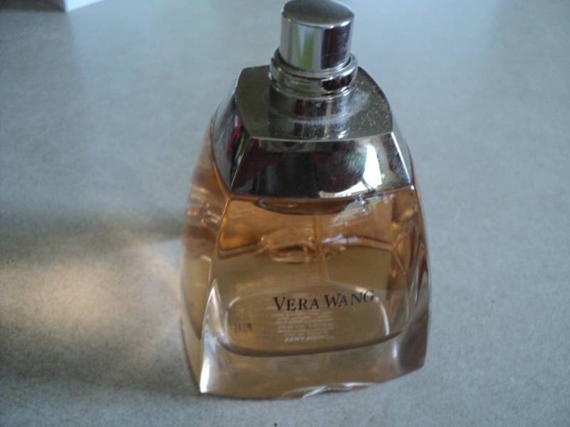 lot 220 image: Vera Wang Perfume retails for $80...
