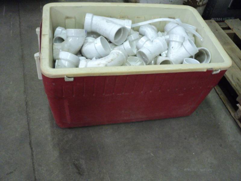 lot 236 image: Cooler Bottom full of Plumbing Supp...