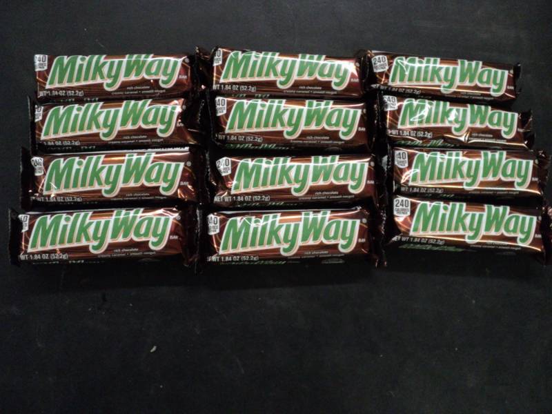 lot 300 image: 12 Milky Way Candy Bars...