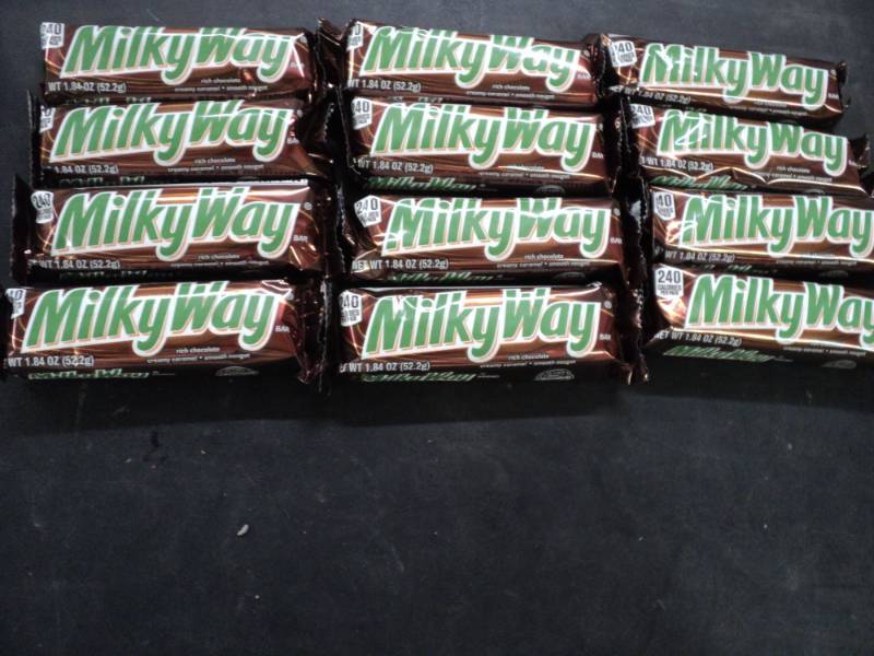lot 302 image: 12 Milky Way Candy Bars...
