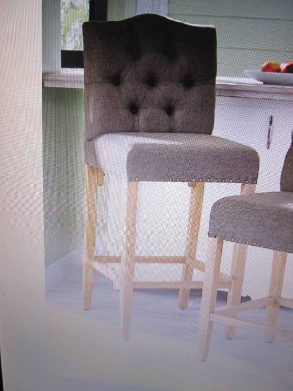 Laney Upholstered Counter Stool ope...