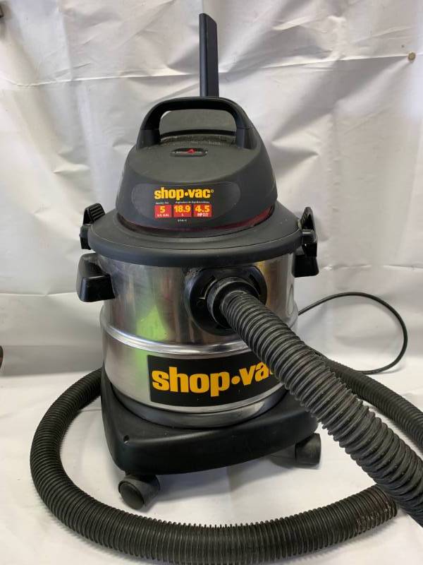 lot 1 image: 5 Gallon Stainless Steel Shop Vac