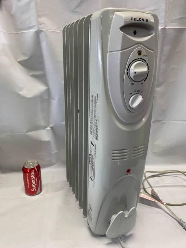 lot 12 image: Pelonis Radiator Space Heater (23 tall)