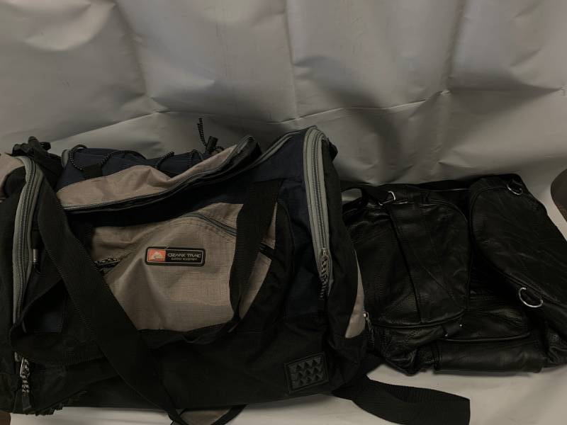 lot 17 image: Lot of 2 Bags (1 Leather 1 Ozark Trail)