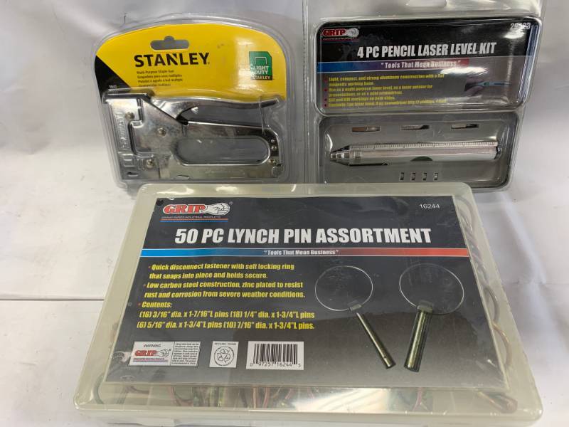 lot 44 image: Stanley Staple Gun, 4pc Laser Level, 50pc Lynch Pin Set